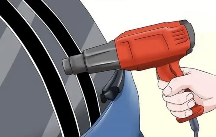 Cách lột keo dán xe bị chết hiệu quả cần kết hợp sấy ở nhiệt độ 40-50°C làm polymer giãn nở